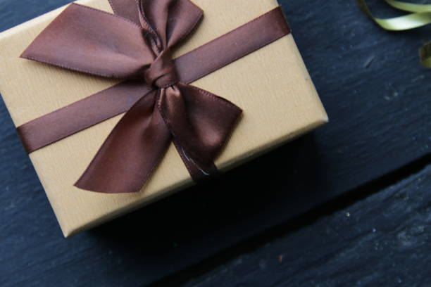 istock Gift with ribbon On vintage background. 1444464430
