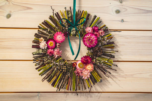istock Modern Christmas wreath hanging 1444465602