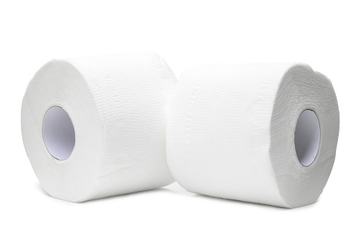 two rolls of white tissue paper or napkin for use in toilet or restroom are isolated on white background with clipping path.