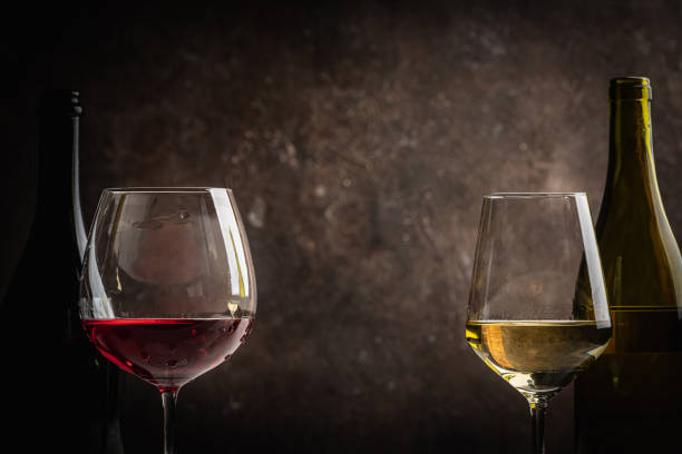 istock Glasses of red and white wine 1444469241