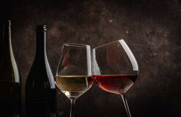 istock Glasses of red and white wine 1444469262