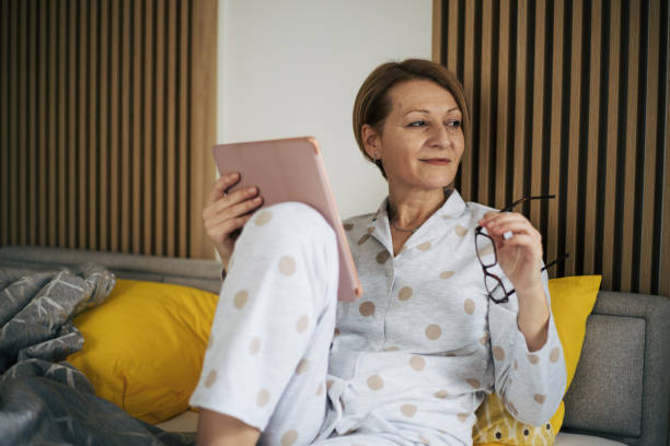 istock Senior woman in bed. 1444469376