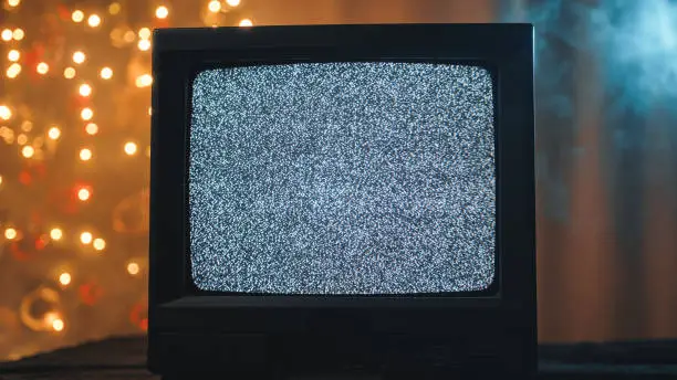 Close up of vintage television on Christmas background