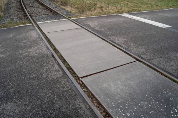 istock Level crossing on a road in the countryside 1444481712