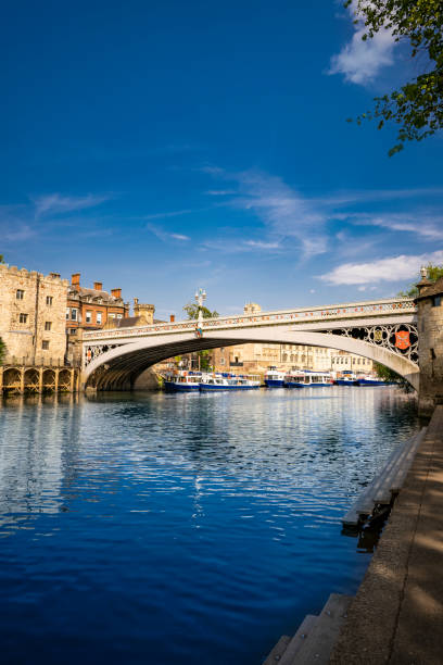 York UK Lendal Bridge over river Ouse and boats in England York UK Lendal Bridge over river Ouse and boats in England United Kingdom york yorkshire stock pictures, royalty-free photos & images