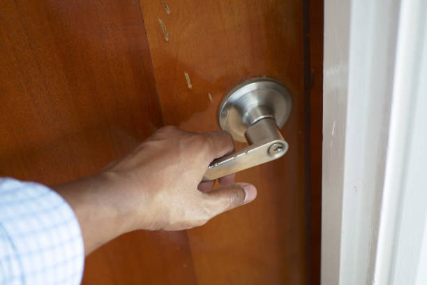 istock Man's Hand Opening door close up 1444487685