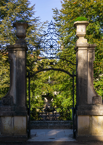 Antique wrought metal gate at the University Botanical Garden in Coimbra, Portugal