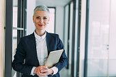 Confident businesswoman in modern office.