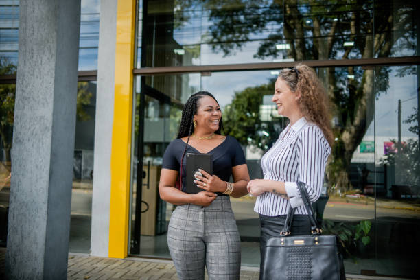 istock Businesswomen talking in front of work 1444490932