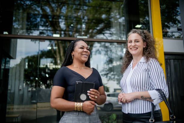 istock Businesswomen talking in front of work 1444490969
