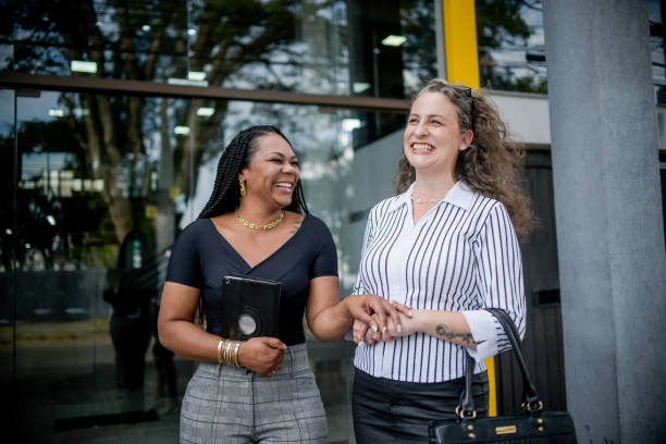 istock Businesswomen talking in front of work 1444491004