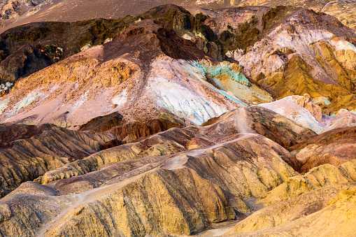 Artist Palette in Death Valley CA, offers viewers a beautiful desert landscape of colorful hills.