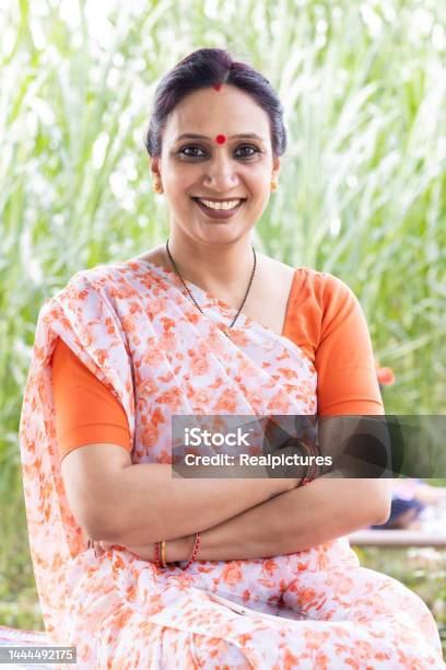 Portrait Of Indian Woman In Sari At Village Stock Photo - Download Image Now - One Woman Only, Women, Culture of India
