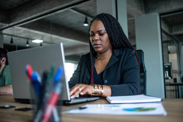 istock Black businesswoman working in the office 1444496453