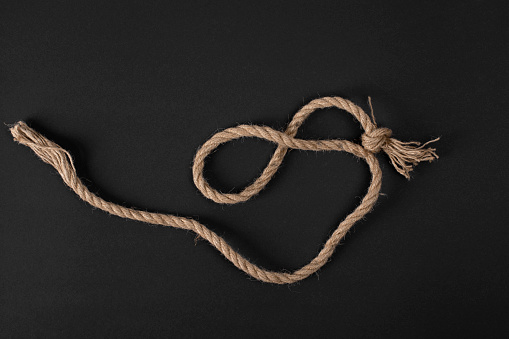 Linen rope on a black background.