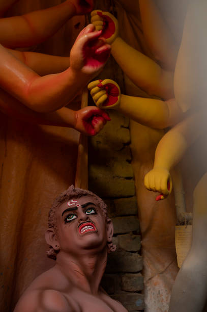 istock Devi durga hand and asur face mud statue at kumartuli kolkata 1444498004