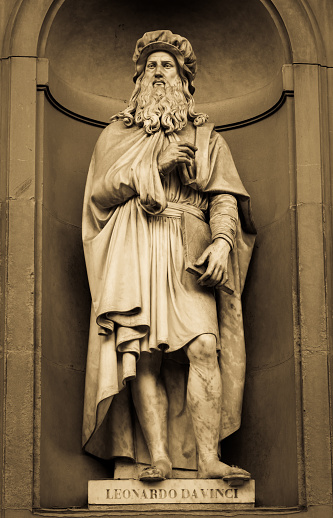 Leonardo da Vinci - Statue of the genius, located in front of Uffizi Gallery in Florence, Italy, public area