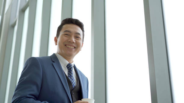 istock Businessman taking a break and drinking coffee. 1444506325