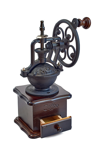 Isolated old vintage coffee grinder
