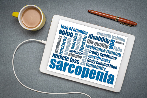 sarcopenia - muscle loss due to aging, word cloud on a digital tablet, health and senior fitness concept
