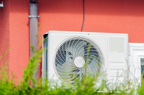 istock Air conditioner compressor outside unit. home winter 1444513722
