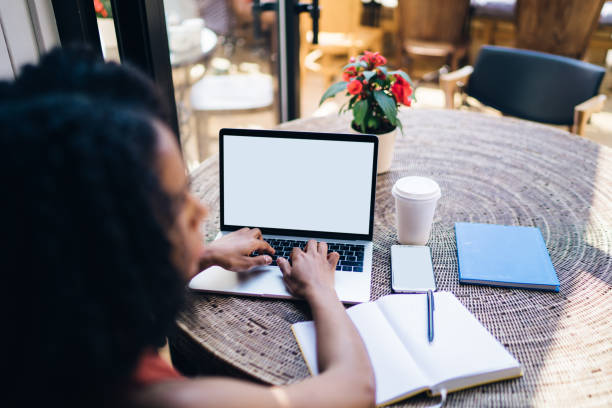 istock Young woman browsing on laptop 1444516414