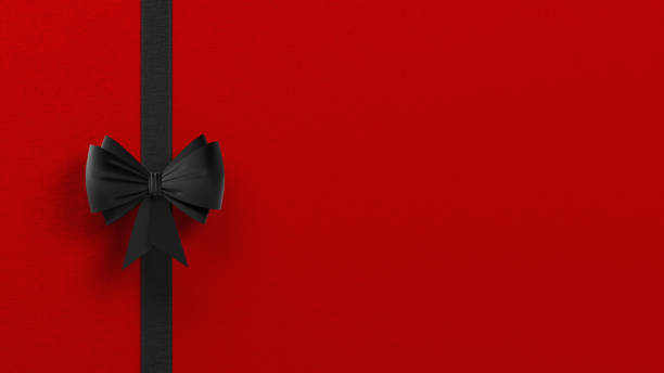istock Black color ribbon on red color background 1444522595