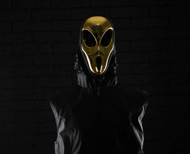 istock portrait of an alien on a black background 1444525585