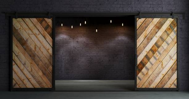 Barn Sliding Wooden Door in Loft Room 3d illustration. Modern interior in loft style barn sliding wooden door in loft room. Studio interior of old house garret stock pictures, royalty-free photos & images