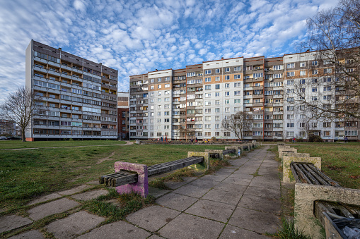 Riga, Latvia - November 13, 2022: The Soviet-era architecture of the Purvciemsresidential area with its ugly, untidy surroundings.