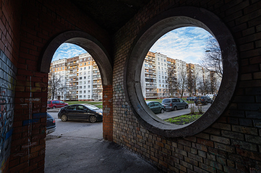Riga, Latvia - November 13, 2022: The Soviet-era architecture of the Purvciemsresidential area with its ugly, untidy surroundings.