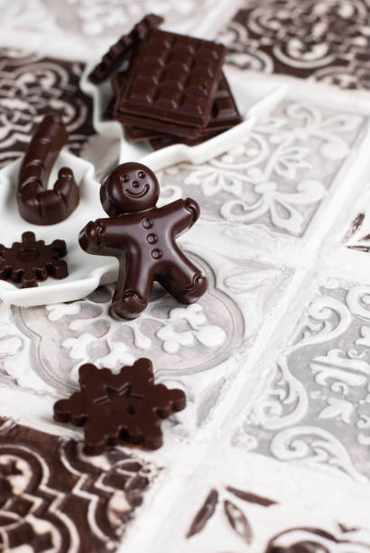 istock Christmas praline gingerbread man, chocolate bar, snowflake, candy cane. 1444530818