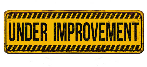 Under improvement vintage rusty metal sign Under improvement vintage rusty metal sign on a white background, vector illustration under renovation stock illustrations