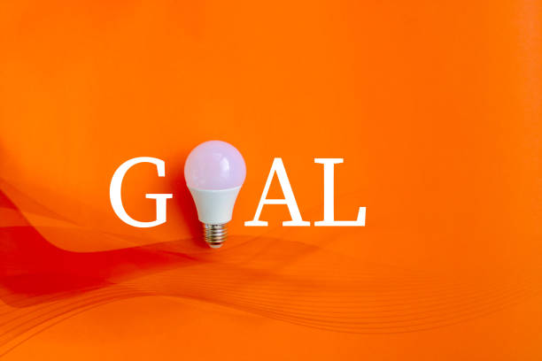 istock Goal lettering created from led bulb on colored background. 1444532723