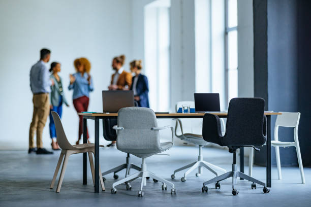 istock Unrecognizable Businesspeople Working Together In A Modern Office Space 1444534710
