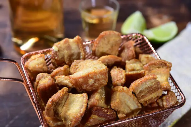 Photo of pork crackling fried and crispy pururuca typical Brazilian food