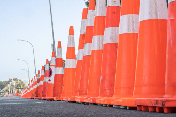 istock Road cone line-up on downtown city street 1444546036