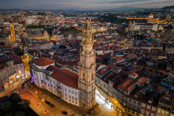 Aerial View of Porto Cityscape and Historic Landmark Clerigos Tower at Dusk in Porto, Portugal stock photo