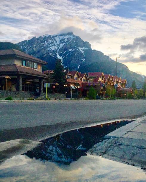 istock Reflections on Banff Avenue, Cascade Mountain in background. Banff, Alberta, Canada. 1444551493