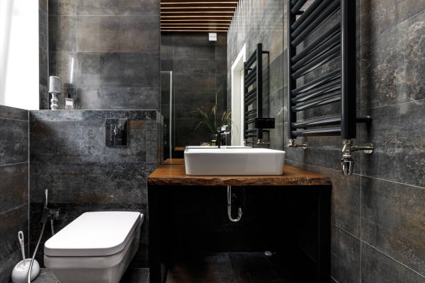 istock Modern bathroom in the house trimmed with black marble 1444552772