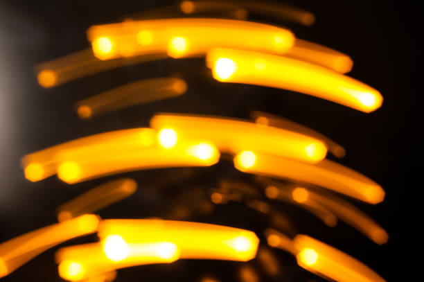 abstract lights christmas black background. defocused. blur and soft focus