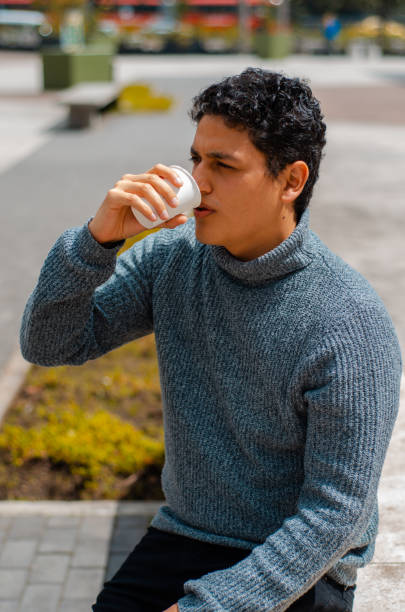 istock Man drinking coffee in the street and copy space 1444558422