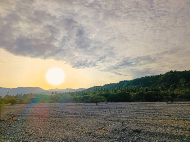 istock Sunrise over mountains and dry river 1444558903
