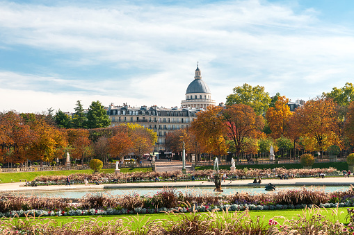 Luxembourg garden in autumn, in Paris. Pantheon cupola in background.  France. October 19, 2022.