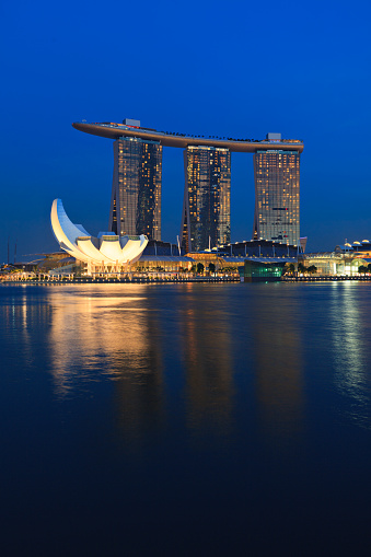 Singapore - May 6, 2011: The Marina Bay Sands complex on sunset on May 6, 2011 in Singapore. Marina Bay Sands is an integrated resort and billed as the world's most expensive standalone casino property