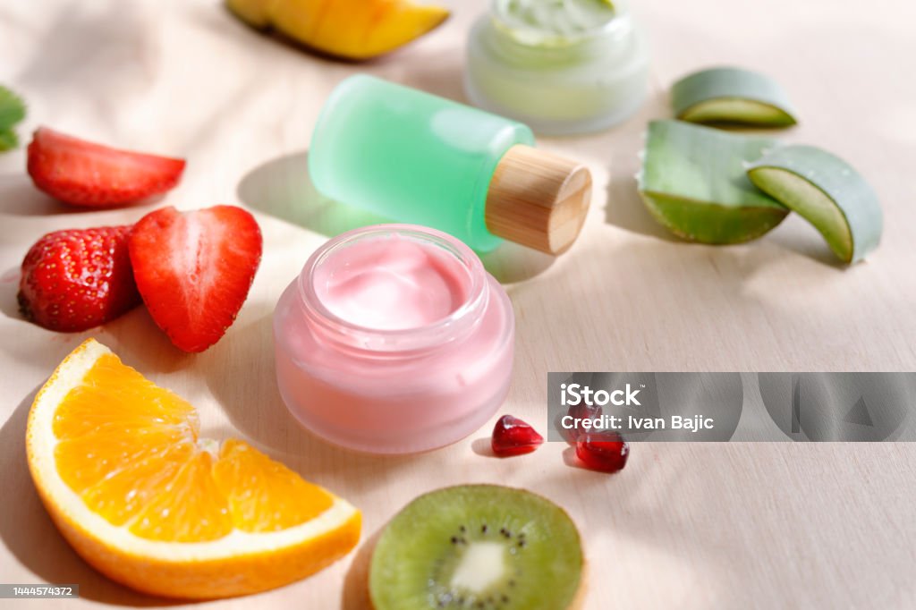 Fruit  moisturizer Cosmetic products with fruit ingredients Skin Care Stock Photo