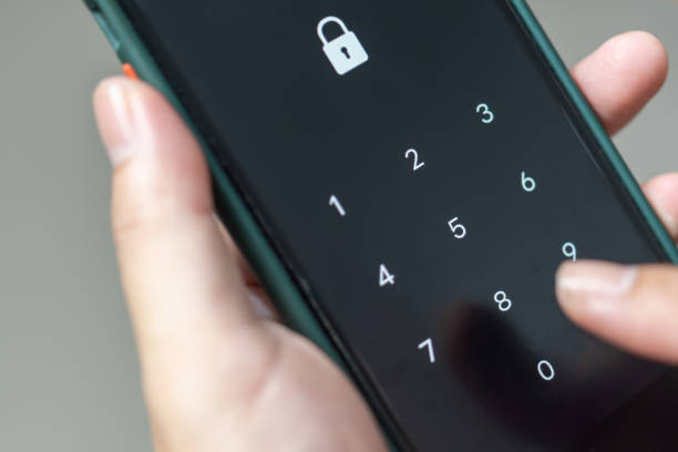 istock Hacking mobile phone with a password to access a smartphone, security threats online Phone lock code. Smartphone protection with 2fa Smartphone protection and security with pin number. Encrypted data. 1444583378