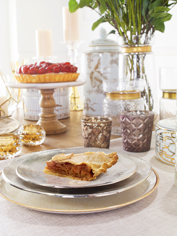 Apple pie in a chic classic table setting