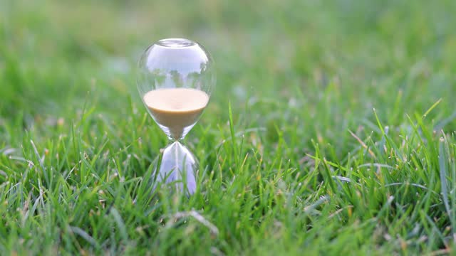 Close-up of Hourglass on the Grass