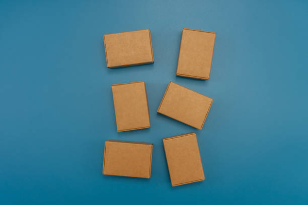 istock Wrapped vintage gift box isolated on blue background 1444586452